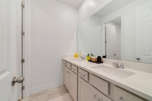 2224 Celebration Blvd, Celebration, FL 34747 - full bathroom featuring double vanity and baseboards