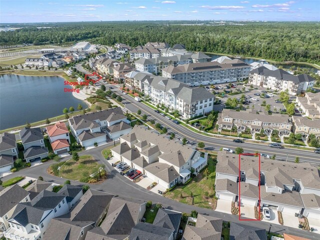 2224 Celebration Blvd, Celebration, FL 34747 - drone / aerial view of a large body of water and a heavily wooded area