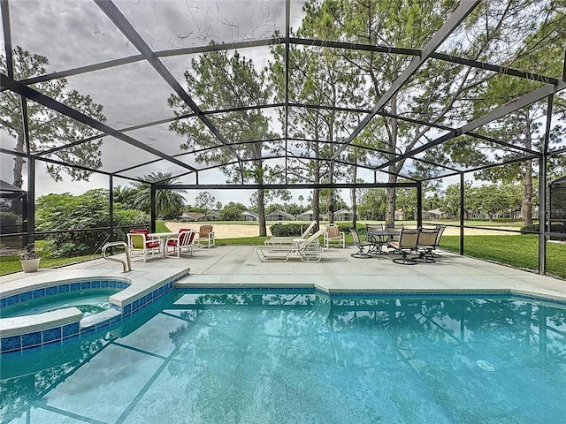 1426 Park Park, Haines City, FL 33844 - view of pool with a patio area, glass enclosure, and a pool with connected hot tub