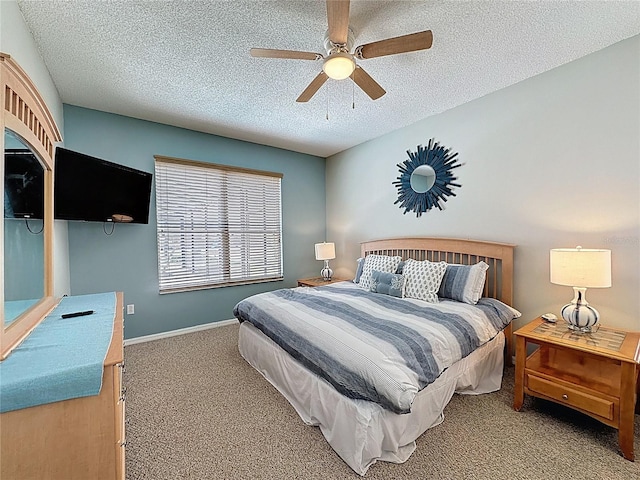 1426 Park Park, Haines City, FL 33844 - bedroom with carpet floors, a textured ceiling, and ceiling fan