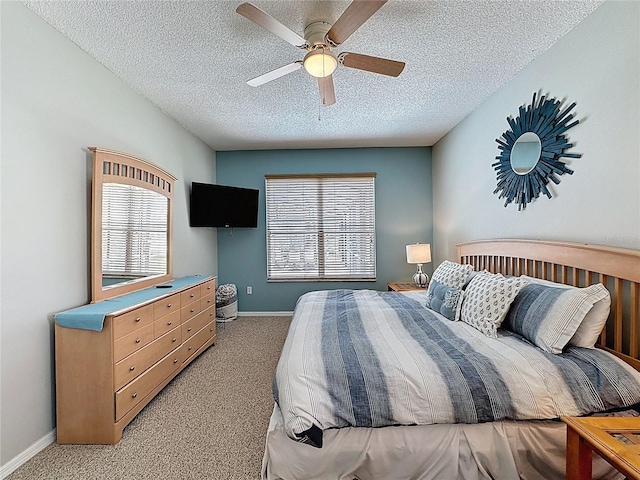 1426 Park Park, Haines City, FL 33844 - bedroom featuring a textured ceiling, light carpet, multiple windows, and ceiling fan