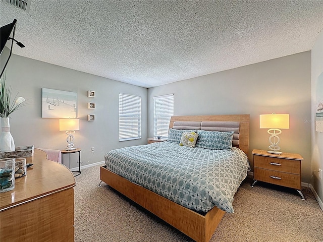 1426 Park Park, Haines City, FL 33844 - bedroom featuring carpet floors and a textured ceiling
