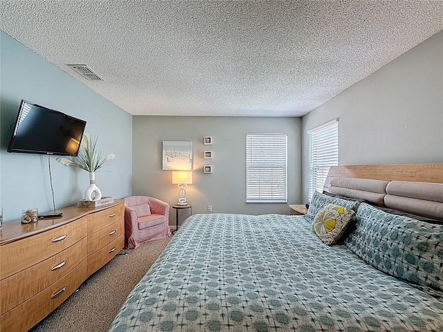 1426 Park Park, Haines City, FL 33844 - bedroom with carpet and a textured ceiling