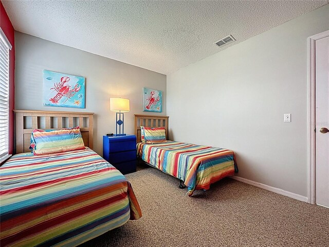 1426 Park Park, Haines City, FL 33844 - carpeted bedroom with a textured ceiling