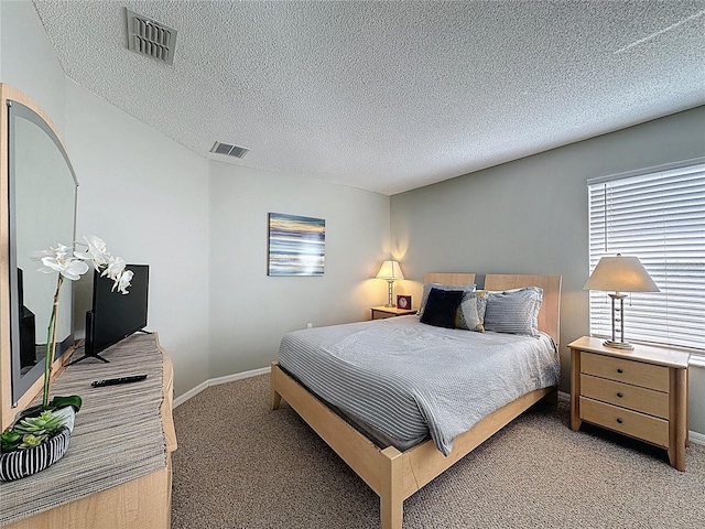 1426 Park Park, Haines City, FL 33844 - bedroom with light colored carpet and a textured ceiling