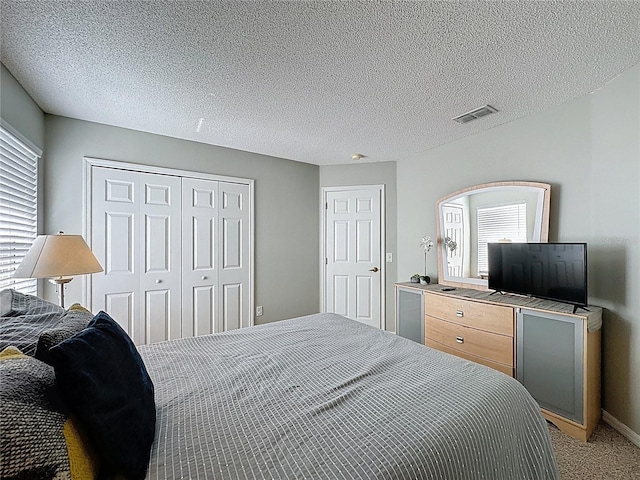1426 Park Park, Haines City, FL 33844 - bedroom featuring light colored carpet and a closet