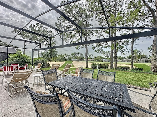 1426 Park Park, Haines City, FL 33844 - view of patio featuring outdoor dining space and glass enclosure