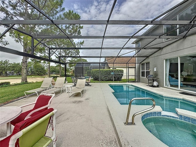 1426 Park Park, Haines City, FL 33844 - view of pool featuring a patio area, a pool with connected hot tub, and a lanai