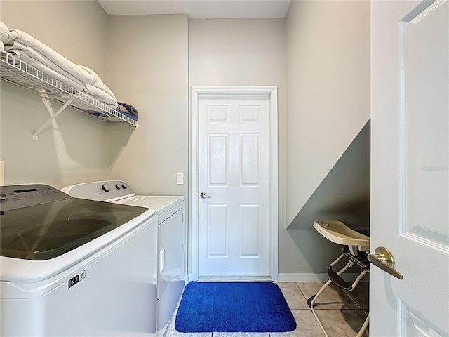 1426 Park Park, Haines City, FL 33844 - laundry room with washing machine and dryer and light tile patterned floors