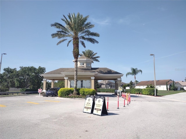 8101 Coconut Palm Way Unit 303, Kissimmee, FL 34747 - view of property featuring uncovered parking