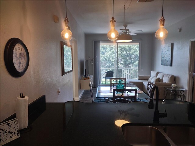 8101 Coconut Palm Way Unit 303, Kissimmee, FL 34747 - dining room featuring a ceiling fan