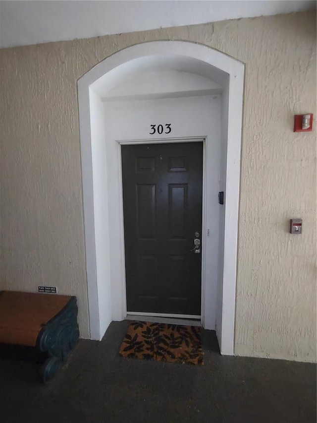 8101 Coconut Palm Way Unit 303, Kissimmee, FL 34747 - doorway to property featuring stucco siding