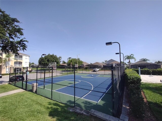 8101 Coconut Palm Way Unit 303, Kissimmee, FL 34747 - view of basketball court with community basketball court and a residential view