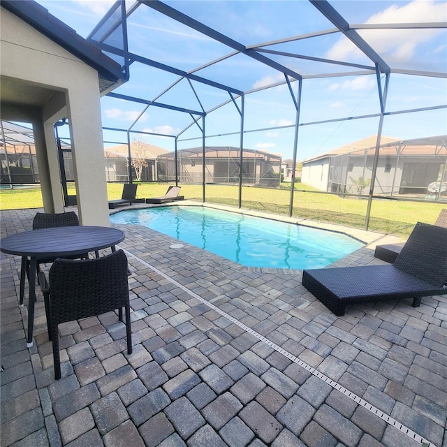 191 Aidans Lndg, Haines City, FL 33844 - swimming pool featuring a patio, a yard, and a lanai