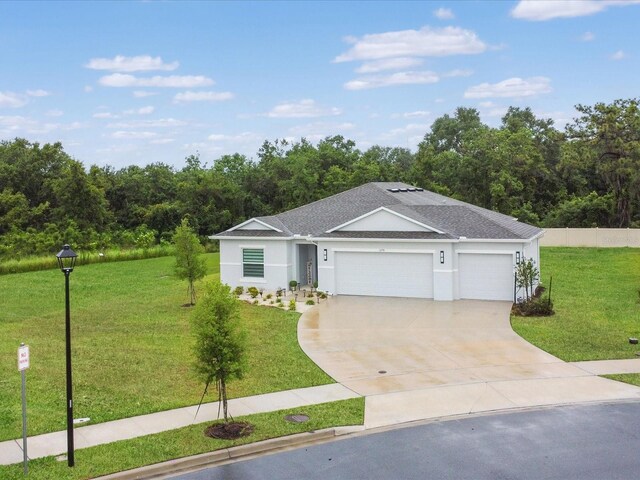 1278 Asher Mason Ave, Kissimmee, FL 34744 - single story home featuring a front yard, an attached garage, driveway, stucco siding, and roof with shingles