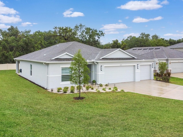 1278 Asher Mason Ave, Kissimmee, FL 34744 - ranch-style house with a garage, stucco siding, driveway, a shingled roof, and a front lawn