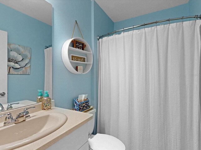 1278 Asher Mason Ave, Kissimmee, FL 34744 - full bathroom featuring vanity and toilet