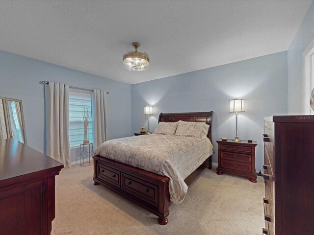 1278 Asher Mason Ave, Kissimmee, FL 34744 - bedroom featuring light carpet and baseboards