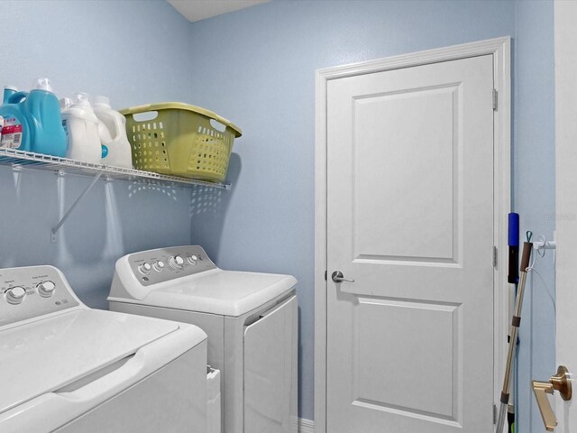 1278 Asher Mason Ave, Kissimmee, FL 34744 - laundry area with washer and dryer