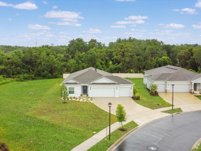 1278 Asher Mason Ave, Kissimmee, FL 34744 - aerial view of property and surrounding area featuring a heavily wooded area