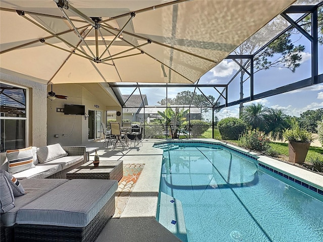 1428 Park Pl, Haines City, FL 33844 - swimming pool featuring a patio, an outdoor hangout area, a lanai, outdoor dining area, and ceiling fan