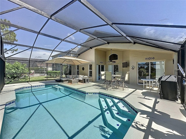 1428 Park Pl, Haines City, FL 33844 - swimming pool with an outdoor hangout area, a patio area, outdoor dining area, and glass enclosure