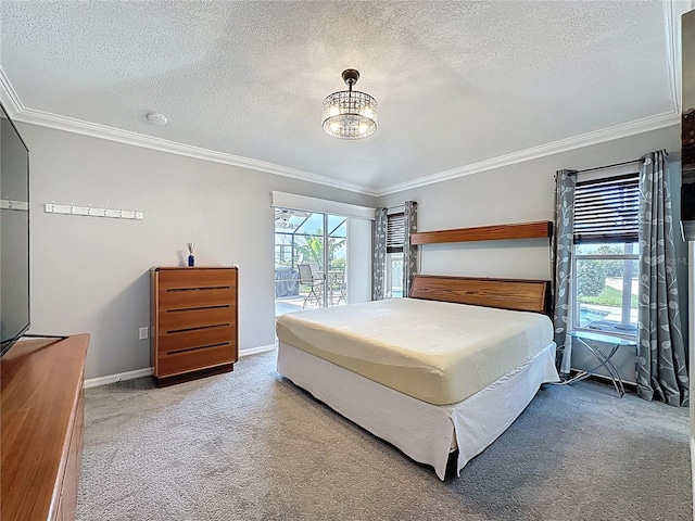 1428 Park Pl, Haines City, FL 33844 - bedroom featuring ornamental molding, carpet, a textured ceiling, access to outside, and a chandelier