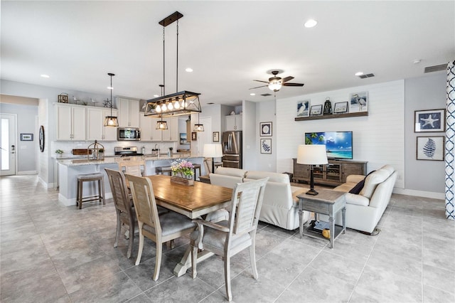 5025 Sunfalls Ave, Saint Cloud, FL 34772 - dining area featuring baseboards, recessed lighting, ceiling fan, and light tile patterned flooring