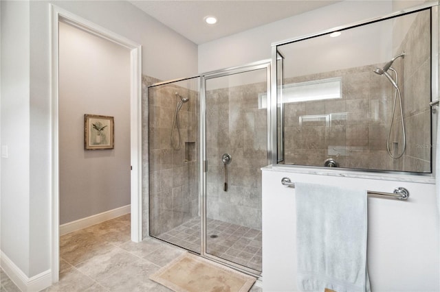 5025 Sunfalls Ave, Saint Cloud, FL 34772 - full bath with a shower stall, baseboards, tile patterned flooring, and recessed lighting