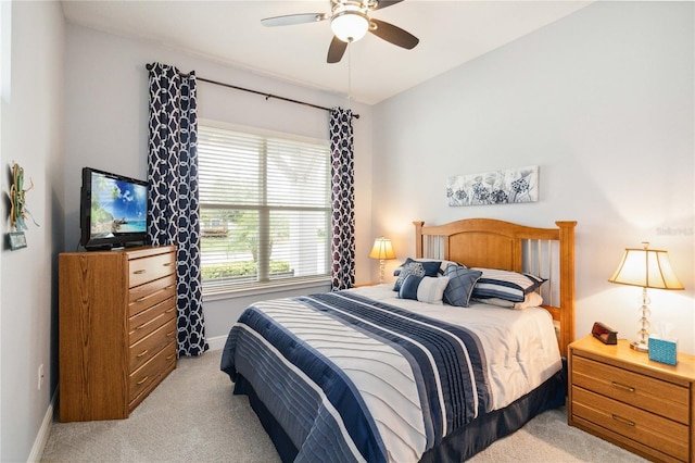 5025 Sunfalls Ave, Saint Cloud, FL 34772 - bedroom with light carpet, baseboards, and ceiling fan