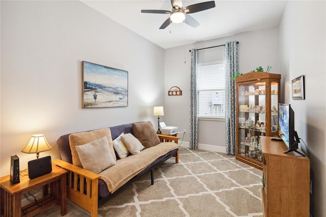 5025 Sunfalls Ave, Saint Cloud, FL 34772 - living room with a ceiling fan, baseboards, and carpet flooring