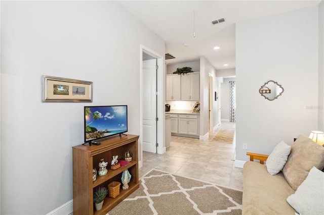 5025 Sunfalls Ave, Saint Cloud, FL 34772 - living room with baseboards, recessed lighting, and light tile patterned floors