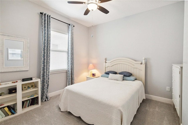 5025 Sunfalls Ave, Saint Cloud, FL 34772 - bedroom with carpet floors, baseboards, and a ceiling fan