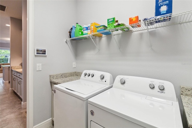 5025 Sunfalls Ave, Saint Cloud, FL 34772 - washroom featuring baseboards, independent washer and dryer, and light tile patterned flooring
