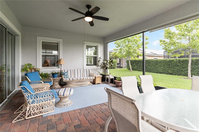 5025 Sunfalls Ave, Saint Cloud, FL 34772 - sunroom / solarium featuring ceiling fan and outdoor dining space