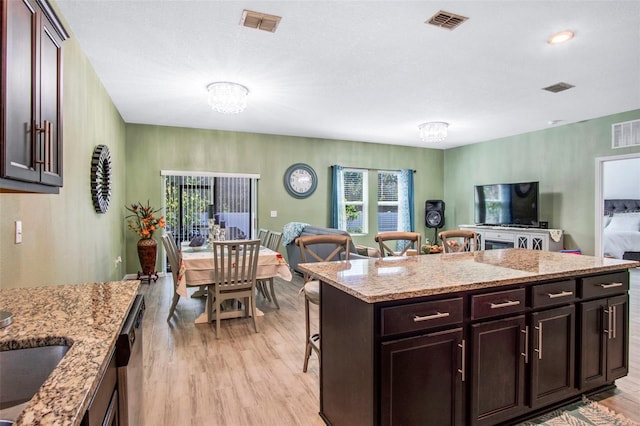 1096 Roberta Rd, Lake Wales, FL 33853 - kitchen with open floor plan, light wood-style floors, and healthy amount of natural light
