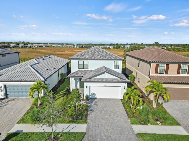 6288 Winding Pine Dr, Nokomis, FL 34275 - traditional-style house featuring decorative driveway and a residential view