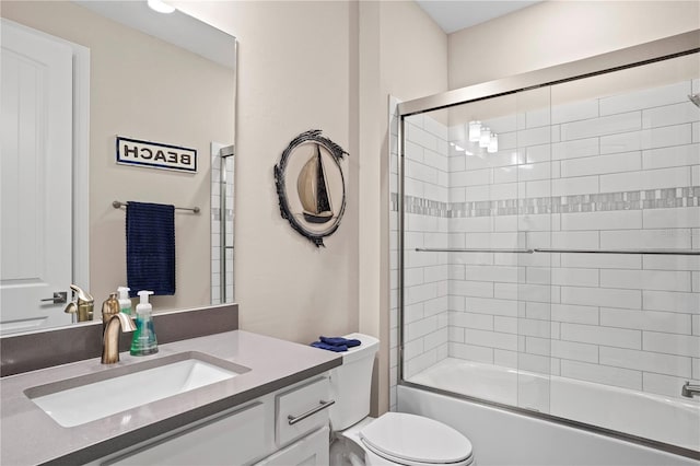 6288 Winding Pine Dr, Nokomis, FL 34275 - full bathroom with vanity, toilet, and enclosed tub / shower combo