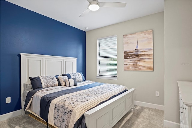 6288 Winding Pine Dr, Nokomis, FL 34275 - bedroom featuring light colored carpet, baseboards, and ceiling fan