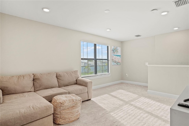 6288 Winding Pine Dr, Nokomis, FL 34275 - living area with baseboards, light colored carpet, and recessed lighting