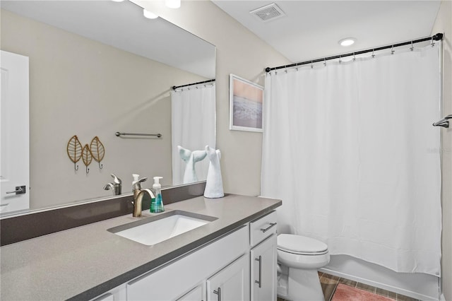 6288 Winding Pine Dr, Nokomis, FL 34275 - full bathroom featuring vanity, toilet, and shower / bath combination with curtain