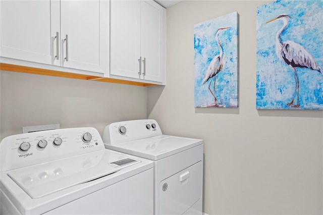 6288 Winding Pine Dr, Nokomis, FL 34275 - washroom featuring cabinet space and washing machine and dryer