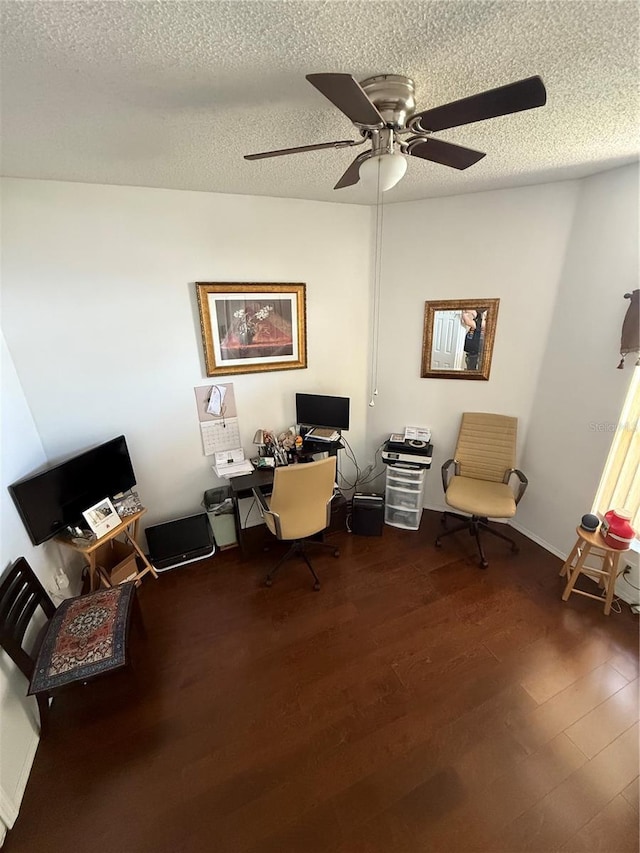 939 Jaybee Ave, Davenport, FL 33897 - office area with dark wood-style floors, a ceiling fan, and a textured ceiling