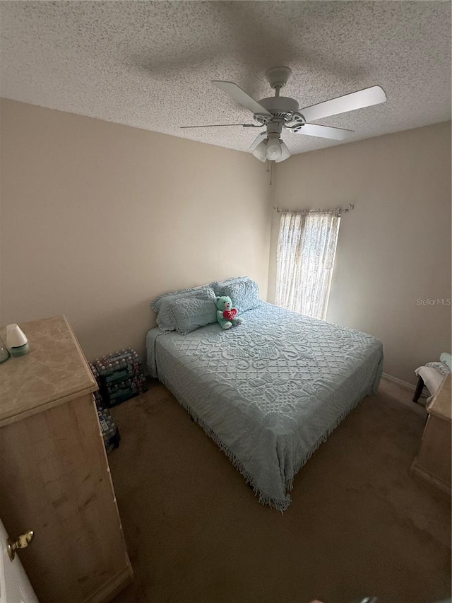 939 Jaybee Ave, Davenport, FL 33897 - bedroom with carpet flooring, a textured ceiling, and ceiling fan