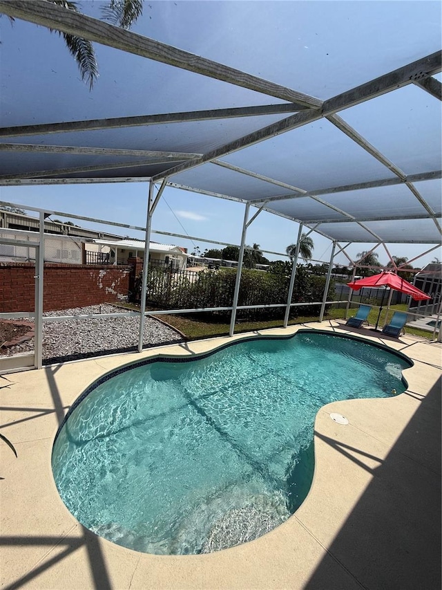 939 Jaybee Ave, Davenport, FL 33897 - outdoor pool featuring a patio and a lanai
