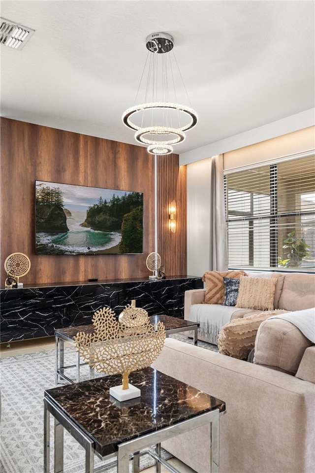 1456 Belle Terre Rd, Davenport, FL 33896 - living area featuring wooden walls and a chandelier