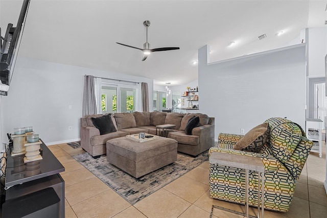 1523 Stafford Ave, Merritt Island, FL 32952 - tiled living room with lofted ceiling and ceiling fan