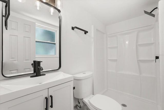 304 W 24th St, Sanford, FL 32771 - full bathroom featuring a shower, vanity, and toilet