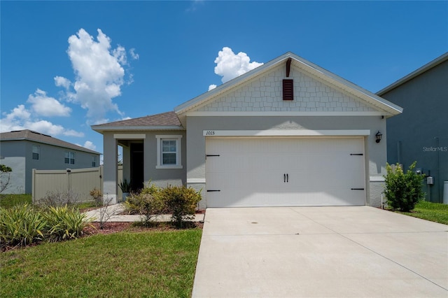 1015 Andean Ln, Davenport, FL 33837 - ranch-style house featuring driveway, stucco siding, and an attached garage