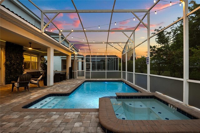 1560 Maidstone Ct, Davenport, FL 33896 - view of pool with a patio, a pool with connected hot tub, a lanai, a ceiling fan, and an outdoor hangout area